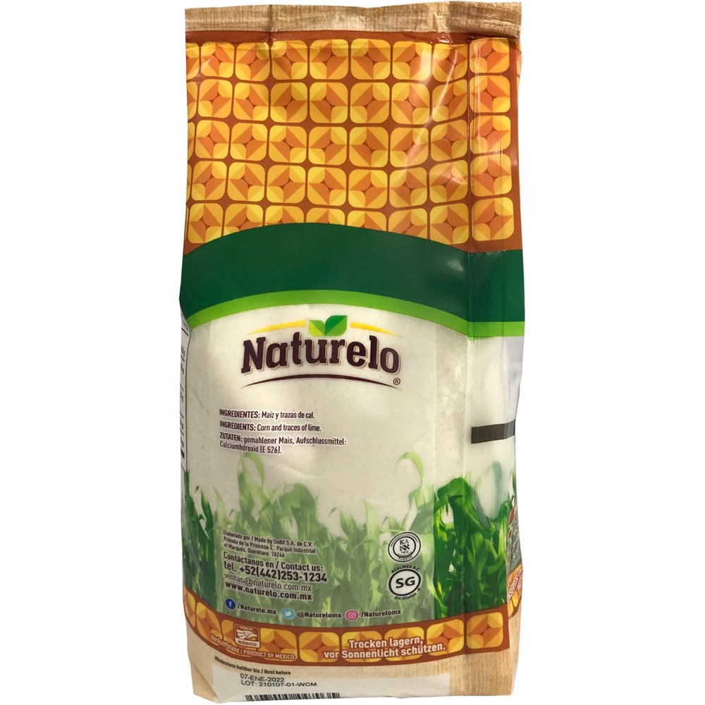 Naturelo-branded bag of maize-based product with green plant imagery and orange patterned packaging